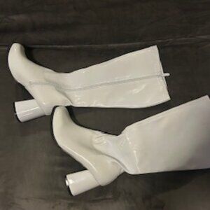 Brand new white patent leather boots